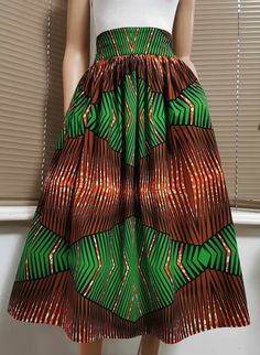 VIVIAN African Printed Mid-calf Skirt 100% Wax Cotton Handmade - Etsy Kitenge Skirts, Green Cotton Bottoms With Gathered Skirt, Green Full Skirt For Summer, High Waist Multicolor Pleated Skirt, Green Flared Skirt With Elastic Waistband, Multicolor Gathered Midi Skirt, Green High Waist Flowy Skirt, Brown Full Lined Skirt, Brown Full Skirt With Lining