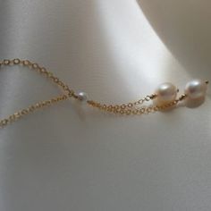 Classic Long Necklace For Weddings, Elegant Double Strand Pearl Pendant Jewelry, Delicate Pearl Lariat Necklace With Pendant, Elegant Double Strand Necklace For Weddings, Elegant Double Strand Backdrop Necklace With Delicate Chain, Elegant Pearl Long Necklace As Gift, Elegant Pearl Long Necklace For Gift, Elegant Single Strand Pearl Long Necklace, Formal Double Strand Long Necklace