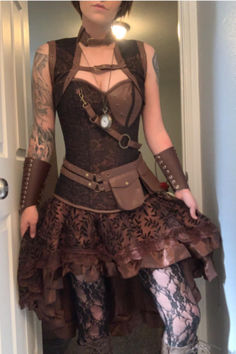 woman wearing a Steampunk costume outfit Punk Corset For Cosplay And Halloween, Steampunk Costume Accessories For Carnival, Steampunk Costume Accessories For Fantasy Events, Gothic Fitted Cosplay Costume For Festival, Fitted Gothic Cosplay Costume For Festival, Punk Costume Accessories For Costume Party, Fitted Punk Cosplay Costume Alternative Fashion, Punk Style Fitted Cosplay Costume For Alternative Fashion, Steampunk Fitted Costume For Cosplay Events