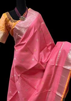 Pink Pure Gadwal silk saree with embroidered  blouse online shopping Comes with prestitched embroidered blouse. Blouse : 36 - 42 size  DETAILS AND CARE Color: pink  Weight : 600 - 800 grams Length : 5.5 m saree + 0.7 m blouse  Width : 48 Inches Fabric : Pure Gadwal silk  Craft Description : gAdwal  Wash Care : Dry Wash Only Shipping Time : 5 - 7 Working days We Ship Worldwide SHIPPING AND RETURNS Shipping Policy : Shipping days as mentioned above, subject to changes based on the government regulations around the prevailing pandemic situation.  Return Policy :   We have a comprehensive returns policy , kindly refer to our policy section to know more . DISCLAIMER Color : There can be a slight variance in the colors of the products on our site from the actual ones. This is attributed to the r Pink Silk Pre-draped Saree With Self Design, Pink Tissue Silk Pre-draped Saree With Self Design, Festive Pink Raw Silk Pre-draped Saree, Pink Cotton Silk Pre-draped Saree With Self Design, Pink Tissue Silk Pre-draped Saree For Festivals, Pink Tissue Silk Saree With Traditional Drape, Designer Raw Silk Pink Saree, Festive Pink Raw Silk Blouse Piece, Pink Raw Silk Traditional Wear For Festivals