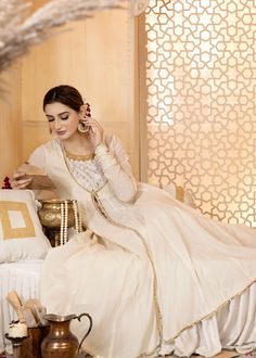 Ivory white pure cotton lawn Kalidar with details on the neckline, sleeves, and bottom. Paired with a churidar and an inner chikan shirt. (Includes Kalidar, inner shirt, and churidar) Luxury Off-white Churidar For Women, Luxury White Floor-length Churidar, Luxury Off-white Women's Churidar, Traditional Cream Cotton Churidar, Elegant White Cotton Churidar, Eid Pics, Fashion Newsletter, Astoria Ny, Thursday Friday