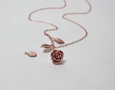 "Rose Gold lovers necklace,Rose Flower Jewelry. Pink Rose Necklace. It is simple and dainty，a great way to let someone know you are loved! it's sweet enough to wear it no need to stack with other necklaces Great present for best friends, couples , wife, girlfriend and brides.teenage girls.everyday necklace,young sister , mom of babe girl, his and her.. - High quality Rose Gold Filled Cable Chain - 17\" Long - All findings are rose gold filled - Rose Gold Plated Rose Pendant - 1.73x0.94\" / 44x24 Rose Gold Jewelry With Rose Detail For Gift, Rose Gold Jewelry With Roses For Her, Delicate Rose Gold Jewelry With Roses, Delicate Rose Gold Necklaces With Roses, Rose Gold Jewelry With Roses For Mother's Day, Rose Designed Jewelry For Mother's Day, Rose Gold Necklaces With Roses For Wedding, Rose Gold Jewelry With Rose Design For Anniversary Gift, Rose Design Rose Gold Jewelry For Anniversary Gift