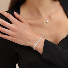 Elevate your style with this exquisite tennis bracelet. Crafted with precision, this stunning piece features a line of sparkling radiant-cut gemstones, each expertly set in a delicate and timeless design. The brilliant facets of the gemstones catch the light, creating a mesmerizing display of elegance and luxury.Carat Weight: 10.05 ctStone Size: 3*3 mmStone Type: Moissanite/GemstoneNumber of Stones: 67 Stone Color: OptionalStone Shape: RadiantWidth: 4 mmThickness: 2.9 mmMaterial: 10K/14K/18K Sol Elegant Sparkling Diamond Bracelet As Gift, Classic Sparkling Diamond Bracelet, Elegant Diamond Bracelet With Sparkling Stones As Gift, Elegant Diamond Bracelet With Sparkling Stones For Anniversary, Elegant Sparkling Diamond Bracelet For Anniversary, Elegant Sparkling Diamond Bracelet, Elegant White Gold Sparkling Diamond Bracelet, Elegant Sparkling Bracelets For Anniversary, Classic Diamond Tennis Bracelet With Sparkle