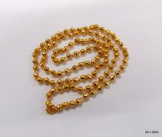 Traditional Ethnic Design 22kt Gold Chain Necklace Gold Beads Jewellery From India, Great Handmade Design, Good For Jewellery Collection. Best Gift Item For Your Loved Ones. Daily Or Party Wear, Easy To Wear. Length - 66 cm (26 inches) We Can Adjust The Length  width - 4 mm weight - 12.250 grams material - 22kt Yellow gold. handmade - yes hallmarked - yes Gold Necklaces With Polished Beads For Diwali, Festive Gold Beaded Chain Jewelry, Gold Temple Necklace With Gold Beads For Diwali, Festive Yellow Gold Beaded Necklace, Traditional Gold Beaded Necklaces With Round Beads, Gold Temple Jewelry Necklace With Faceted Beads, Traditional Yellow Gold Jewelry With Faceted Beads, Gold Necklace With Round Beads For Diwali, Gold Beaded Necklaces For Formal Festive Occasions