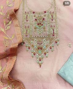 Item Overview ATHARVA Hand Embroidery Salwar Kameez/Pink Peach Chanderi Silk Shirt/ Gota Patti Chiffon Dupatta/Custom Stitch Unstitch/Anarkali/Gift/Churridar Dno. CH1832 Fabric: * Shirt - Chanderi Silk- Hand Embroidered Neck 2.5 Mts - Beautiful Hand Embroidery * Dupatta: Chiffon Chinnon Dupatta- All over Exclusive Gota Patti Embroidery - 2.5 Mts- Latkans Tassels * Bottom Santoon Silk 2.5 Mts. Excusive Hand Embroidered Party Wear Punjabi Suit. Customization: * Fabrics Customization: Designs Can b Transitional Pink Georgette Anarkali Set, Transitional Pink Kurta With Chikankari Embroidery, Pink Kurta With Chikankari Embroidery For Transitional Season, Traditional Pink Anarkali Set For Transitional Season, Designer Pink Salwar Kameez For Transitional Season, Pink Kurta With Zari Work For Transitional Season, Transitional Pink Chanderi Salwar Kameez, Transitional Anarkali Salwar Kameez In Pink, Pink Resham Embroidery Kurta For Transitional Season