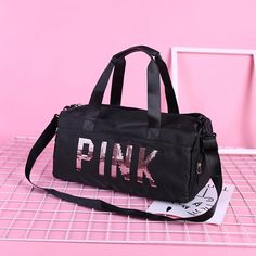 This 20-inch duffle bag is perfect for a weekend getaway or an overnight excursion. Lots of storage with super fun colors. Sporty Letter Print Travel Bags, Sporty Travel Bag With Letter Print, Sporty Pink Duffle Bag For Sports, Black Sports Bag With Letter Print, Black Sports Bags With Letter Print, Sporty Letter Print Bags For Sports, Sporty Letter Print Sports Bag, Sporty Gym Backpack Bag, Sporty Gym Backpack With Large Capacity