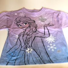 Nwt Cotton On Kids X Disney Frozen Elsa Short Sleeve T-Shirt Size 3 Short Sleeve Silver Sparkle Snowflakes On Front Elsa Graphic On Front Elsa On The Back Cotton Purple Ombre A159 Cute Long Sleeve Purple T-shirt, Graphic Print Tops For Disney Fan Events In Winter, Cute Purple Tops With Character Print, Cute Purple Winter Top, Disney Cotton T-shirt For Winter, Disney Long Sleeve Cotton T-shirt, Long Sleeve Disney Cotton T-shirt, Purple Cotton Tops With Cartoon Print, Purple Long Sleeve Top With Character Print