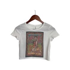 This faded distressed Janis Joplin Band Tee crop top is perfect to dress up or wear casual. The image is sublimated onto the material making the top buttery soft! **This crop top is fitted and runs slightly on the smaller side.** Fabrication: 52% Airlume combed and ring-spun cotton 48% poly Janis Joplin Band Tee Vintage Retro Crop Top, Short Sleeve Crop Top, Crop Top for Women, Boho Hippie Clothing, 90s Fashion, Streetwear Summer Streetwear Tops With Vintage Print, Vintage Print Tops For Summer Streetwear, Fitted Vintage Print T-shirt For Spring, 90s Printed Fitted T-shirt, 90s Fitted Printed T-shirt, 90s Style Fitted Printed T-shirt, Spring Grunge Fitted T-shirt, Fitted Sublimation Print Grunge Tops, Fitted Grunge Top With Sublimation Print