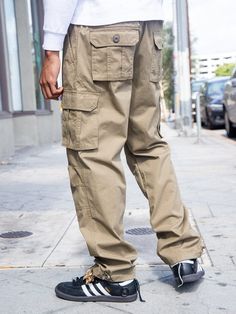 Military Parachute Pants With Side Pockets, Military Style Pants For Streetwear, Khaki Combat Pants With Pockets, Combat Pants With Multiple Pockets, Military Style Full Length Cargo Pants For Fall, Military Style Full Length Bottoms With Cargo Pockets, Military Full Length Cargo Pants For Fall, Fall Military Cargo Style Bottoms, Fall Military Style Full Length Cargo Pants