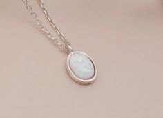 "Handmade Necklace 14k Solid Gold Opal Necklace, Sterling Silver 925 Opal Necklace, Oval Opal Necklace, 14k Gold White Opal Necklace, Gift for Mom, Mom Gift, Mom Gift * Material: High Quality 925 Sterling Silver, 14k Solid Gold * Finished Color: Sterling Silver, yellow and rose gold filled H O W ∙ T O ∙ O R D E R - Select options from the drop-down menu - Add to cart and proceed to checkout GEMSTONE DETAILS Stone: White Opal Size:9x6 mm Shape: Oval *White opal is an excellent grounding stone * I White Oval Necklaces For Anniversary, White Oval Necklace For Anniversary, White Oval Link Necklace For Anniversary, Handmade Oval White Gold Necklace, Dainty Oval Hallmarked Necklace, White Gold Oval Cabochon Necklace Gift, White Oval Engraved Necklaces, Gold Opal Necklace, Opal Necklace