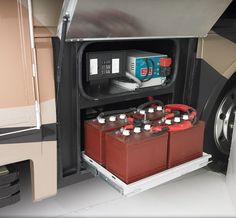 the inside of a vehicle with batteries and other items