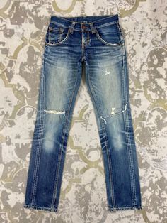 29x32 Distressed Blue Vintage Edwin Jeans Denim- JN3539  Size: 29 Actual measurement (inches): Waist - 29 Front Rise - 7.5 Hips - 37 Thigh - 9.5 Knee - 7 Leg Opening - 13 Inseam - 32 Outseam - 40 Material : Cotton  #JN3539 Distressed Medium Wash Rigid Denim Jeans, Mid-rise Faded Ripped Jeans, Faded Ripped Mid-rise Jeans, Rugged Distressed Straight Leg Jeans, Faded Ripped Denim Jeans, Faded Ripped Rigid Denim Jeans, Faded Ripped Jeans In Rigid Denim, Rugged Ripped Dark Wash Jeans, Fitted Distressed Washed Blue Jeans