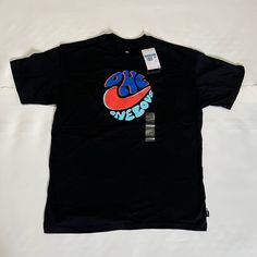 One Love Nike Tee Size Medium Brand New Great Condition Feel Free To Offer And Check Out Other Items In My Closet! Thank You For Viewing, Have A Good Day Nike Retro Tops With Letter Print, Retro Nike Tops With Graphic Print, Nike Retro Short Sleeve Top, Shirts Nike, Nike Tee, Nike Tees, One Love, Nike Shirts, Nike Blue