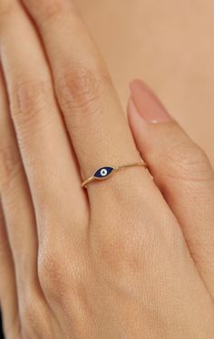 ◾14k Solid Gold Evil Eye Ring For Women, Evil Eye Ring, Charm Dark Blue Eye Ring, Greek Evil Eye Ring, Evil Eye Stackable Ring, Gift for Her Make yourself feel one step ahead with our unique rings that you can buy for yourself or gift to your loved ones. ◾MADE TO ORDER◾ * Raw Material: 100% 14K Solid Gold * Gold Color selection: Yellow Gold, Rose Gold, White Gold * All sizes from 2-11 US * 14k (585) Stamp is available in all our products. * Our products are guaranteed and sent with a certificate. ◾PROCESSING & SHIPMENT◾ Production Process * it is made within 1-3 working days and delivered to the cargo. * All our products are shipped with gold certificate(14k) after quality control. Shipping Process * Cargo is sent by express (1-3). Gold Jewelry Maintenance * You can do it with the help of Blue Stackable Enamel Ring, Blue Enamel Ring In 14k Gold, Adjustable Blue 14k Gold Rings, Blue Enamel Ring In 14k Gold, Round Shape, Fine Jewelry Rings With Evil Eye For Gifts, Fine Jewelry Evil Eye Ring As Gift, Fine Jewelry Evil Eye Rings For Gifts, 14k Gold Evil Eye Ring, Yellow Gold Evil Eye Rings As Gifts