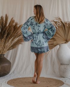 Wrap yourself in the embrace of our Elsa Kimono, a garment that gracefully blends eco-conscious luxury with a serene aesthetic. This exquisite kimono, reversible in nature, offers two tranquil hues – a deep, calming blue and a gentle ice blue, each reflecting a facet of peace and mindfulness. Tailored for a relaxed yet elegant fit, we suggest selecting a size that's 15-20 cm (6-8 inches) larger than your chest circumference, ensuring a comfortable and serene wearing experience. This kimono is mo