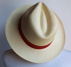 Authentic Hand Woven Panama Hats. Made in Montecristi, Ecuador were the original straw Panama Hats were born centuries ago. Handmade Fedora Panama Hat In Toquilla Straw, Handmade Toquilla Straw Panama Hat With Curved Brim, Classic Handmade Adjustable Fedora, Handmade Toquilla Straw Fedora With Short Brim, Handmade Fedora Hat Band From Toquilla Straw, Classic Handmade Hat With Flat Brim, Classic Handmade Hats With Curved Brim, Handmade Classic Hat With Curved Brim, Traditional Panama Hat With Short Brim