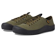 Teva Terra Canyon - Men's Shoes : Olive : Tackle any adventure in full comfort with the Teva Terra Canyon sneakers. Low top cut. Lace-up closures. Logo tag at side of uppers. Pull tabs on tongues. Toe cap design. Removeable insoles. round, closed toe silhouette. Textile uppers, linings, and insoles. Synthetic outsoles. Imported. Measurements: Weight: 11 oz Product measurements were taken using size 9.5, width D - Medium. Please note that measurements may vary by size. Weight of footwear is based Casual Closed Toe Walking Shoes With Vibram Sole, Rubber Sole Lace-up Walking Shoes For Outdoor Activities, Lace-up Sneakers With Rubber Toe Cap For Outdoor, Casual Closed Toe Sneakers For Outdoor Activities, Outdoor Closed-toe Sneakers With Rubber Sole, Comfortable Walking Shoes For Outdoor Activities With Round Toe, Outdoor Walking Shoes With Rubber Sole, Lace-up, Comfortable Walking Shoes For Outdoor Activities, Outdoor Lace-up Walking Shoes With Rubber Sole