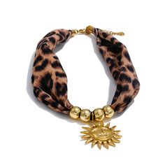 🌻 Fall/Winter Leopard & Sun and Flower Pendant Necklaces – Statement Jewelry for Trendsetters Add a touch of wild elegance to your fall and winter wardrobe with the Leopard & Sun and flower Pendant Necklaces. This fashion-forward piece combines the allure of bold animal prints with the timeless beauty of sunflowers, creating a necklace that effortlessly elevates any outfit. Crafted from durable polyester, this unique accessory is designed for women who want to make a statement with their style. 🌼 Product Highlights Leopard & Sun and flower Design: A chic fusion of trendy leopard print with a delicate sun and flower pendant adds a captivating contrast that makes this necklace truly eye-catching. Premium Polyester Construction: Built to last with high-quality polyester, offering a lightwei Animal Print Jewelry, Leopard Necklace, Necklaces Statement, Stylish Blazer, Love And Co, Dream Doll, Gold Sun, Weather Wear, Fall Winter Wardrobe