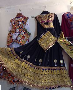 Afghan kuchi traditional dress is made of good quality long lasting fabric with beautiful embriodary Traditionally such Afghanistan new design frocks are used as bridal dress. Most of girls also like and recommend such dresses for wedding, Nikkah and Mehndi night events. The dress measurements are kept average. If you need this frock in exact measurements you need, then please send us measurements which best fit on your body Black Dress With Dabka In Traditional Drape, Black Traditional Drape Dress For Navratri, Black Traditional Drape Dress For Festivals, Ceremonial Traditional Maxi Dress For Festivals, Traditional Black Festival Dress, Traditional Black Dress For Festival, Black Maxi Dress With Dabka Work, Bollywood Abaya With Dabka Work For Festivals, Black Dress With Dupatta For Navratri