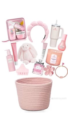 a pink basket filled with lots of items