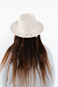 We love this white leather hat band! This hat band features a tie back with tassels trimmed with metal GP engraved caps. This hat band is made of genuine leather. Simply place this leather band around the crown of your hat and tie the strings into a knot to keep in place. Let the tassels hang down. Shop more hat bands here. White Adjustable Fedora With Flat Crown, Adjustable White Fedora With Flat Crown, Adjustable Fringe Hat With Curved Brim, White Adjustable Flat Brim Felt Hat, White Adjustable Hat With Flat Crown, Adjustable White Felt Hat With Flat Brim, Adjustable Fringe Hats, White Adjustable Flat Crown Hat, Festival Cream Hat Bands