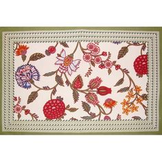 a rug with flowers and leaves on it