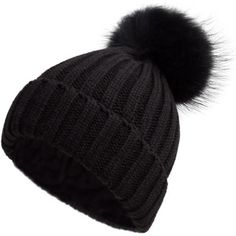 a black hat with a pom - pom on the front and bottom part