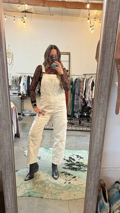 Stay warm and stylish this winter with our Winter White Overalls. Made from light weight white denim, these carpenter style overalls feature adjustable straps and a small barrel design. Perfect for a casual day out or a chilly night in, these overalls are a must-have addition to your wardrobe. Trendy White Denim Jumpsuit For Spring, Utility Jumpsuits And Rompers With Adjustable Straps For Spring, Trendy Cotton Overalls With Suspenders, Spring Overalls With Adjustable Straps, Fall Cargo Style Overall Jumpsuits And Rompers, Cotton Overalls For Fall, Beige Overalls For Spring, White Overall Jumpsuits And Rompers With Pockets, Spring Utility Overalls With Bib Front