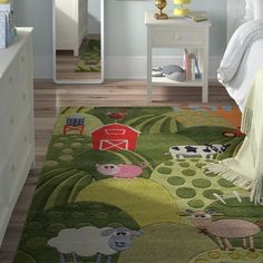 a child's bedroom with sheep and farm animals rug on the floor in front of bed