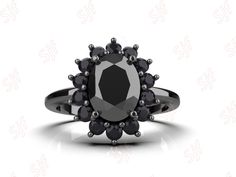 a black diamond ring on a white background