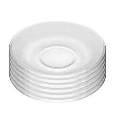 stack of white plates stacked on top of each other in front of a white background