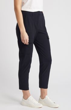 Soft and ultrastretchy fabric means all-day comfort in these relaxed-fit cargo pants boasting a breezy cropped fit and a plethora of handy pockets. 26" inseam; 13" leg opening;10 3/4" front rise; 15" back rise (size Medium) Zip fly with hook-and-bar closure Front slant pockets; cargo flap-patch pockets 68% nylon, 32% elastane Machine wash, line dry Imported Athleisure Ankle-length Cargo Pants With Side Pockets, Functional Elastane Pants With Side Pockets, Sporty Ankle-length Cargo Pants With Side Pockets, Black Activewear With Pockets For Work, Sporty Tapered Leg Cargo Pants For Work, Athleisure Straight Leg Cargo Pants For Workwear, 4-way Stretch Athleisure Cargo Pants, Functional Cargo Pants With Cargo Pockets For Work, Functional Cargo Pants With Multiple Pockets For Work