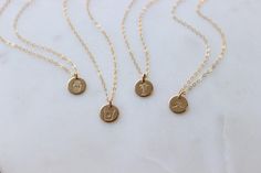 Our sweet tiny dot, stamped with one of our little symbol stamps. A solid 9mm disc is hand-stamped. Use the drop down box to select 16", 18" or 20" length. Different chain length can be requested using 'Notes' at checkout.  Handmade in Eau Claire, WI.  All of our jewelry is handmade to order just for you so each piece Dainty 14k Gold Filled Engraved Charm Necklaces, Dainty Engraved 14k Gold Filled Charm Necklaces, Dainty 14k Gold Filled Engraved Charm Necklace, Dainty Small Charm Necklace For Everyday, Everyday Tiny Charm Necklaces In 14k Gold Filled, Everyday Tiny Charm Necklace In 14k Gold Filled, Dainty Hand Stamped Charm Necklaces For Everyday, Dainty Hand Stamped Charm Necklace For Everyday, Everyday Engraved 14k Gold Filled Charm Necklace