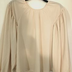 Beige Georgette Chiffon Blouse Dolman Sleeves Cuffs Allows For Length Of Sleeves This Is The Same Style And Description Of The Black Dressy Chiffon Blouse Next To This Listing New With Tags Cream Blouse With Puff Blouson Sleeves, Cream Blouse With Blouson Puff Sleeves, Chiffon Blouse With Sheer Sleeves For Spring, Beige Long Sleeve Blouse With Blouson Sleeves, Elegant Beige Tops With Blouson Sleeves, Chic Blouse With Bishop Sheer Sleeves, Flowy Long Sleeve Chiffon Blouse, Brunch Blouse With Blouson Bishop Sleeves, Blouson Bishop Sleeve Blouse For Brunch