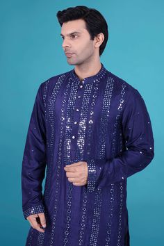 Upgrade your wardrobe with our luxurious Mens Kurta Pajama J171.N216 featuring intricate mirror work. Our premium design adds a touch of sophistication and elegance to any occasion. Elevate your style with this exclusive piece that pays homage to the world of art and fashion. Festive Designer Bandhgala With Mirror Work, Festive Bandhgala With Gota Work For Eid, Unstitched Bandhgala With Gota Work For Navratri, Bandhgala With Mirror Work For Diwali, Diwali Bandhgala With Mirror Work Straight Kurta, Blue Bollywood Bandhgala With Mirror Work, Designer Blue Sherwani With Gota Work, Blue Sherwani With Gota Work, Blue Bollywood Sherwani With Gota Work