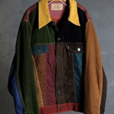 Rare Only 300 Made The Type 3 Cord Trucker In Mash-Up Is A Corduroy Trucker Made From Eleven Different Found Off-Cuts Of Corduroy Fabric. This Was The Last Of It, And There Was Only Enough For 300 Jackets. Levi's Vintage Clothing Embrace Season’s Past With A Mash-Up Of Colorful Corduroy. Dressed In The Velvety Fabric With Retro Colours Reigning Throughout, The Updated Trucker Silhouette Hosts A Classic Button Closure And Chest Pockets; Undeniably Levi’s With Its Brand Tab Sitting Front And Centre. Style #560430000 Size Medium Chest Pit To Pit: 21.5 Inches Length: 24-24.5 Inches Arm Length: 26 Inches Composition & Care * 100% Cotton * Non-Stretch Corduroy * Wash And Dry Inside Out With Retro Long Sleeve Levi's Outerwear, Retro Levi's Long Sleeve Outerwear, Levi's Retro Long Sleeve Outerwear, Fall Streetwear Outerwear With Color Matching, Multicolor Cotton Color Block Outerwear, Multicolor Cotton Denim Jacket For Winter, Multicolor Cotton Denim Jacket For Fall, Retro Cotton Color Block Outerwear, Multicolor Patchwork Long Sleeve Denim Jacket