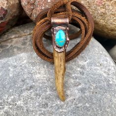 This rustic necklace features a colorful piece of Arizona Turquoise from the Kingman Mine. It's been set into pure copper using the electroforming process. A rustic patina has been added to finish it off.  It comes with a 30" leather cord and gift box.  2.50" tall A truly unique piece! Handmade in my shop in Northern Michigan Artisan Handmade Copper Turquoise Necklace, Artisan Handmade Turquoise Copper Necklace, Brown Rustic Jewelry With Patina, Rustic Brown Patina Jewelry, Rustic Hand Forged Brown Jewelry, Rustic Brown Hand Forged Jewelry, Artisan Rust-colored Jewelry With Patina, Rustic Patina Jewelry For Festival, Rustic Bronze Electroformed Necklace