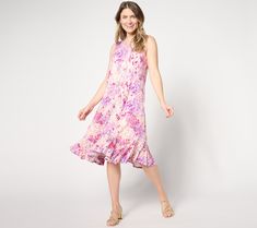 Who's that lovely lady? Everyone will be asking as you whoosh by in this ruffled tank dress. The perfect complement to your summer social scene, this party-ready piece is a carefree confident look that won't go unnoticed. From LOGO by Lori Goldstein®. Knee-length Sleeveless Dress With Ruffle Hem For Spring, Flirty Sleeveless Summer Dress For Day Out, Sleeveless Ruffled Dress For Summer Garden Party, Summer Sleeveless Ruffled Dress For Garden Party, Casual Sleeveless Dress With Ruffle Hem For Spring, Feminine Sleeveless Knee-length Summer Dress, Sleeveless Midi Dress With Ruffle Hem For Spring, Spring Sleeveless Midi Dress With Ruffle Hem, Feminine Summer Midi Dress With Ruffle Hem