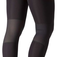 the leggings are black and have mesh panels on them, while there is no visible