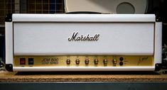 the marshall amplifier is sitting on top of a counter