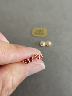 SCREW BACK/14K Solid Gold Butterfly Stud Earrings- 14K Solid Gold Quantity: One Pair Color : Red / Pink Materials : 14K Solid Gold Size : 3.5mm * 6mm *14K Solid Gold will not tarnish. *Good for sensitive skin. * Metal components are 14K Solid Gold including earring backs. * Suitable for delicate and sensitive ears. * Comes in a jewelry box. If you need extra boxes for gifting....just let us know! Red 14k Gold Pierced Earrings, Hypoallergenic 14k Gold Red Jewelry, 14k Gold Red Earrings For Pierced Ears, Red Hypoallergenic Dainty Earrings, Red 14k Gold Earrings For Anniversary, Red 14k Gold Earrings, Dainty Red 14k Gold Earrings, Butterfly Earrings Gold, Butterfly Stud Earrings