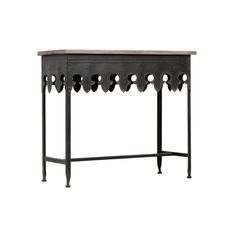 an iron and wood console table with holes in the top, on a white background