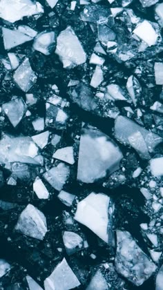 an image of ice cubes that are melting in the water or on the ground