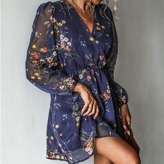 Grab your besties and head to brunch in this chiffon mini dress featuring a floral print, surplice neckline, elasticized waist, semi-sheer long peasant sleeves, full lining, and an A-line silhouette. Step into this dress and embrace its versatile charm, perfect for any occasion where you want to radiate elegance and confidence. Product Code: CAA05A2E106UU/CAA05A2E106RZ/CAA05A3E125MD/CAA05A2E106TG/CAA05A3J102UK/CAA05A2E106AZ/CAA05A2E106EZ Chic Floral Print Chiffon Dress For Brunch, Chic Floral Chiffon Dress For Brunch, Floral Print Mini Chiffon Dress For Brunch, Spring Floral Print Mini Chiffon Dress, Floral Print Chiffon V-neck Mini Dress, Chic Mini Chiffon Dress With Floral Print, Knee-length Chiffon Mini Dress For Brunch, Chiffon V-neck Mini Dress With Floral Print, Spring Chiffon Mini Dress For Date Night