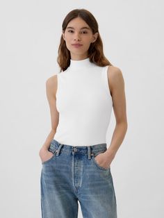 Ribbed Sleeveless Mockneck T-Shirt | Gap Factory Trendy Ribbed Turtleneck Tank Top, Casual Turtleneck Tank Top For Spring, Stretch High Neck Top With Ribbed Neckline, Spring Ribbed High Neck Tank Top, Stretch Ribbed White Turtleneck, Spring High Neck Ribbed Tank Top, Casual High Neck High Stretch Tank Top, Casual Stretch Mock Neck Top With Funnel Neck, Classic High Neck Top With Ribbed Neckline