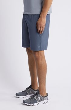 Move with ease throughout your day in these sporty shorts cut from stretch fabric with UPF sun protection 8" inseam Elastic/drawstring waist Front slant pockets; back patch pocket UPF 50+ sun protection 86% polyester, 14% spandex Machine wash, line dry Imported Sports Bermuda Shorts With Built-in Shorts, Sporty Bermuda Bottoms With Built-in Shorts, Casual Bermuda Shorts With Moisture-wicking, Casual Bermuda Moisture-wicking Shorts, Sporty Bermuda Shorts With Built-in Shorts, 4-way Stretch Sports Shorts With Side Pockets, Sporty Shorts With Functional Pockets, Sports Shorts With Pockets, Knee-length, Athleisure Athletic Shorts With Functional Pockets