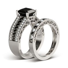 Modern and sophisticated, this ring set suits her impeccable style. This unique design features a black princess cut center stone and smaller black round stones set across the center of this band. Borders of white round stones grace the top and bottom of the band, completing this exceptional design. The coordinating wedding bands are decorated with alternating black and white stones. Jewelry makes a great gift - surprise her with this ring any time of the year. Carat Weight: 3.6 ctStone Size: 8 mmStone Type: Jeulia® StoneNumber of Stones: 1 Stone Color: Fancy BlackStone Shape: RoundCarat Weight: 2.186 ctStone Size: 1.75,1,1.2,1.1,1.25,1.3,1.5,1.6,1.7 mmStone Type: Jeulia® StoneNumber of Stones: 99 Stone Color: Fancy Black, Diamond WhiteStone Shape: RoundWeight: 7.21 gWidth: 6.34 mmHeight: Black Diamond Wedding Rings Sets, Womens Wedding Ring Sets, Black Diamond Rings, Engagement Rings Wedding Bands Set, Black Diamond Wedding Rings, Black Diamond Engagement Rings, Diamond Bridal Ring Sets, Black Engagement Ring, Princess Cut Engagement