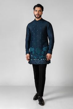 Teal blue plain kurta with pintuck detailing. Paired with a pintucked Nehru Jacket hand embroidered with resham, cutdana and contrasting plain black pant. - Aza Fashions Traditional Festive Kurta With Pintucks, Festive Traditional Kurta With Pintucks, Traditional Kurta With Pintucks For Eid, Traditional Pintucks Kurta, Designer Long Sleeve Kurta For Work, Embroidered Long Sleeve Bandhgala For Work, Blue Nehru Jacket For Festive Workwear, Festive Blue Nehru Jacket For Workwear, Festive Blue Nehru Jacket For Work