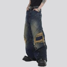 Introducing our 2023 Spring-Summer Collection patchwork men's high-waist jeans with a rock-n-roll trend that will make you stand out!Why It's A Must-HaveThis unique piece is perfect for those who are ready to express their individuality and show off their trend for couture. With its baggy fit. distressed denim. vintage-inspired patchwork. and high-waist cut. it's a traditional piece that speaks to all the trendsetters out there.Distinctive Features: Grunge Style: With its loose silhouette and di Trendy Patchwork Bottoms For Streetwear, Trendy Recycled Denim Cargo Jeans For Streetwear, Urban Style Ripped Recycled Denim Bottoms, Urban Ripped Recycled Denim Bottoms, Patchwork Denim Blue Jeans For Streetwear, Denim Blue Patchwork Jeans For Streetwear, High Rise Patchwork Jeans For Streetwear, Denim Patchwork Pants For Streetwear, Patchwork Denim Cargo Jeans For Streetwear