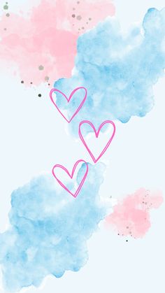 two hearts drawn in pink and blue watercolors on a light blue sky background